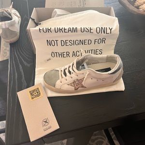 Golden Goose Superstar with gold glitter star